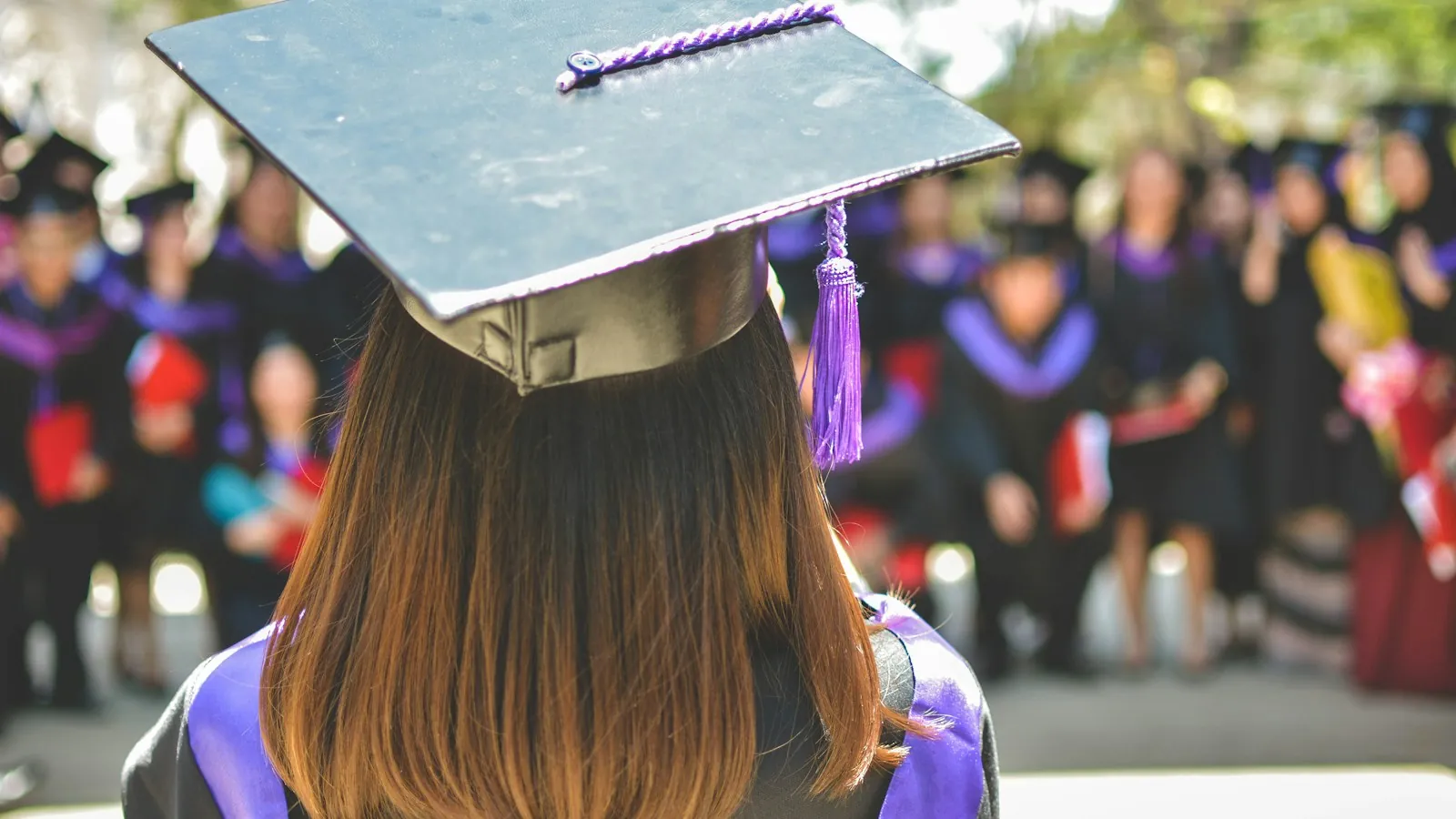 A graduate in cap and gown