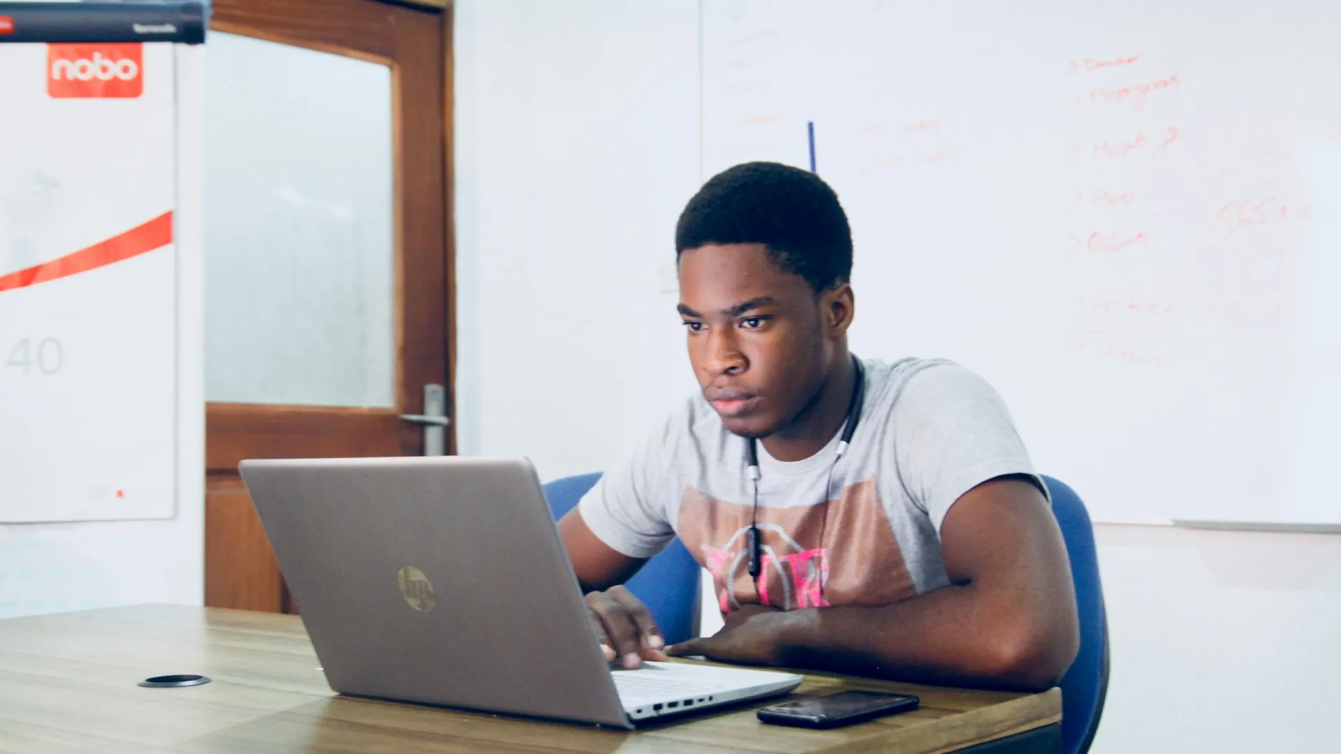 A student studying on a laptop